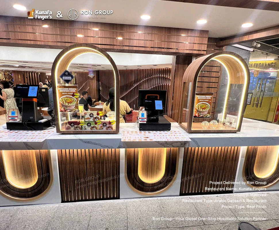 Kunafa Fingers dessert counter with arches