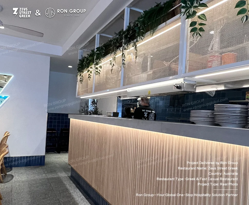Zeus Street Greek service area with blue tiled kitchen