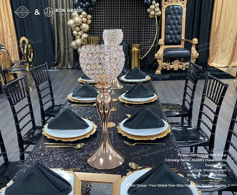Alyssa's Chic Creations RonGroup-Alyssas_Chic_Creations-Black_And_Gold_Wedding_Table_Setting.webp