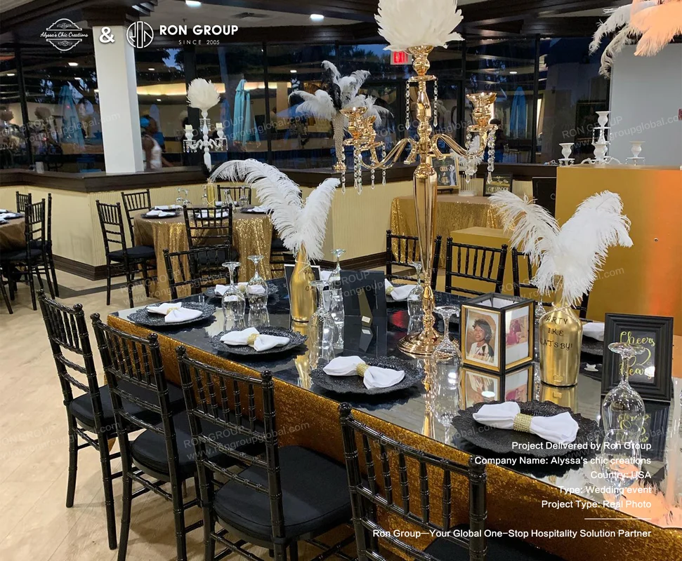Alyssa's Chic Creations RonGroup-Alyssas_Chic_Creations-Elegant_Black_And_Gold_Table_Setting.webp