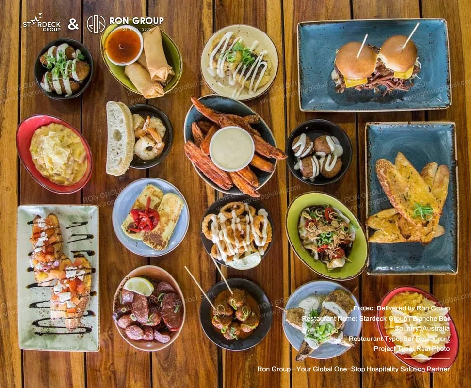 Blanche Bar RonGroup-Blanche_Bar-Variety_Of_Plated_Dishes.webp
