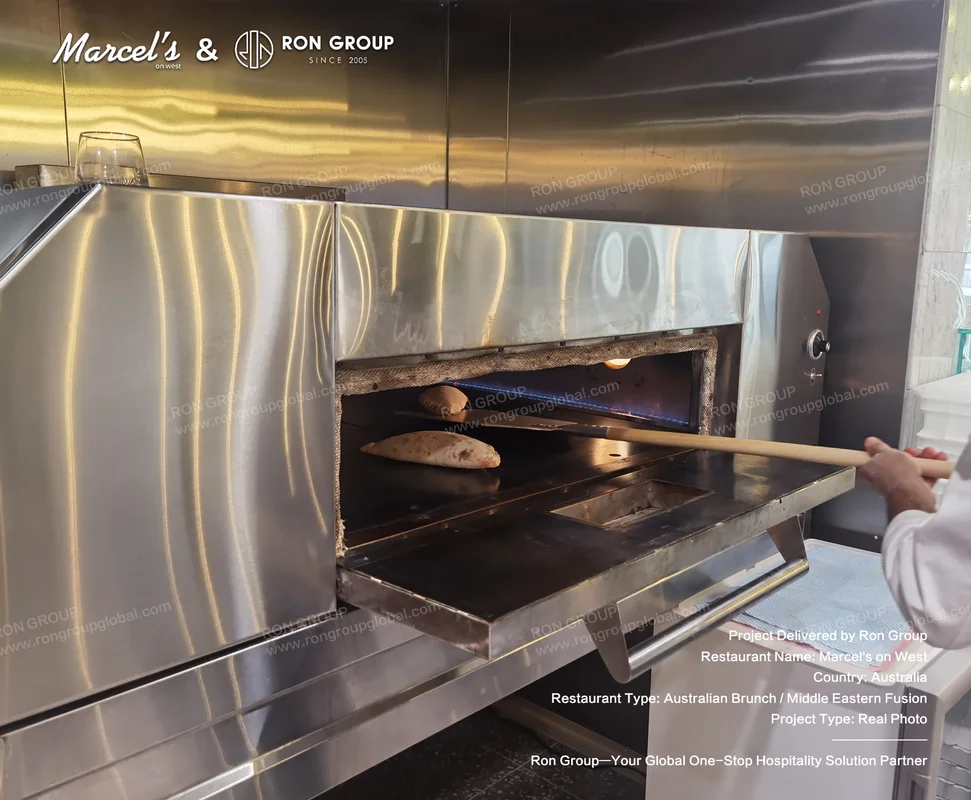 Brunch On West RonGroup-Brunch_On_West-Commercial_Pizza_Oven_In_Use.webp