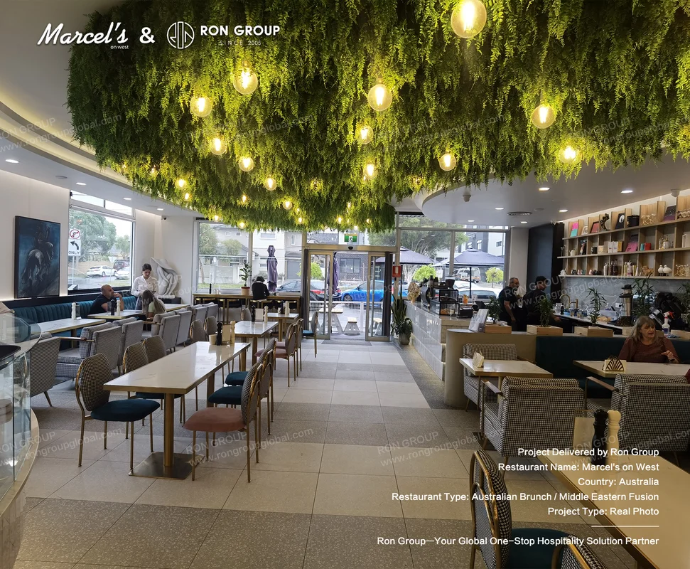 Brunch On West RonGroup-Brunch_On_West-Greenery_Ceiling_With_Lights.webp