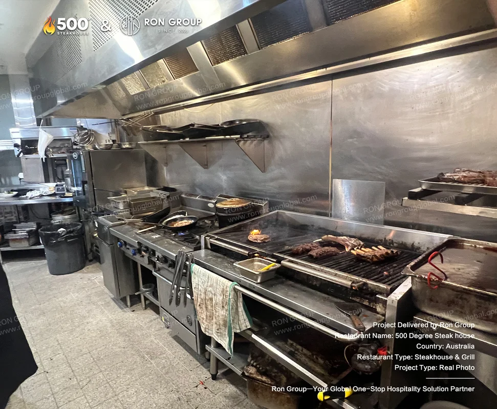 Open-flame grill kitchen at 500 Degrees Steakhouse