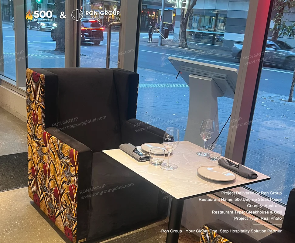 Custom booth seating with golden sides at 500 Degrees Steakhouse