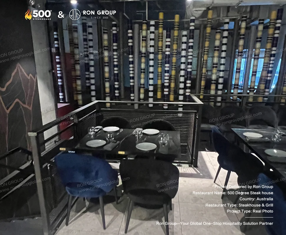 Marble tables and velvet chairs in the main dining area