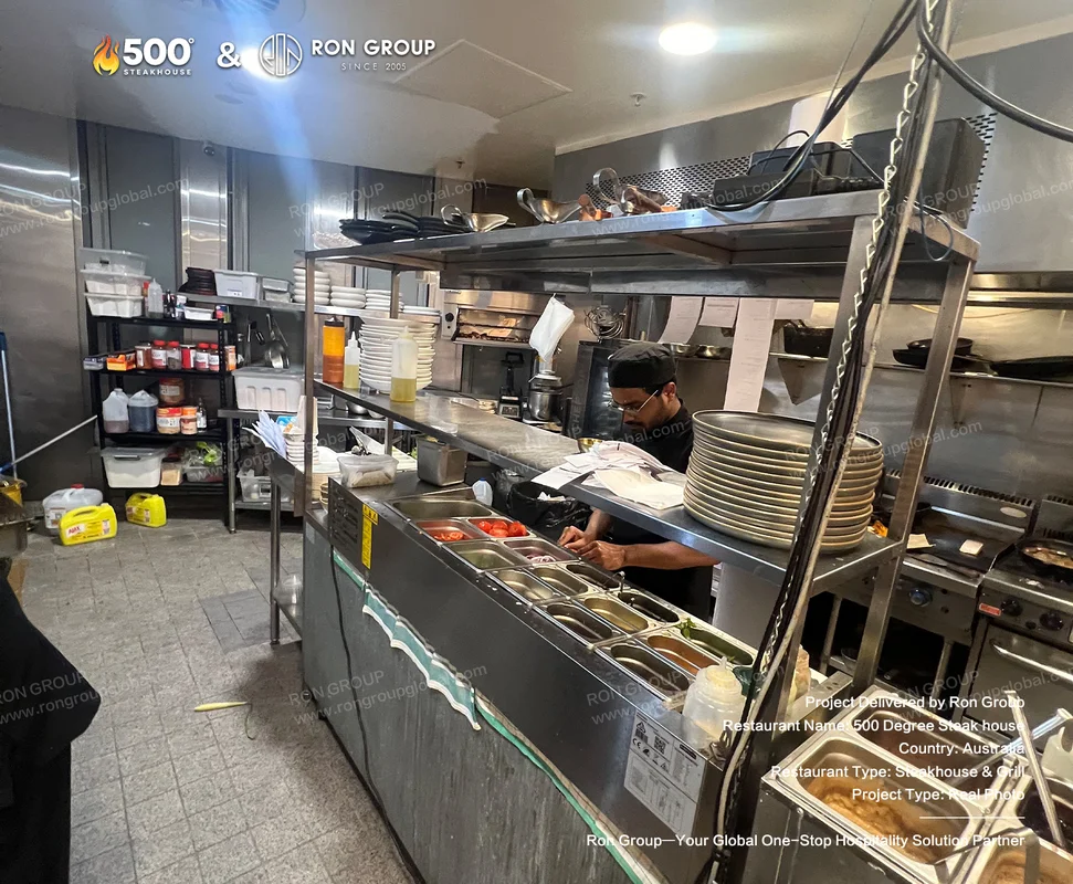 Stainless steel prep workstations at 500 Degrees Steakhouse
