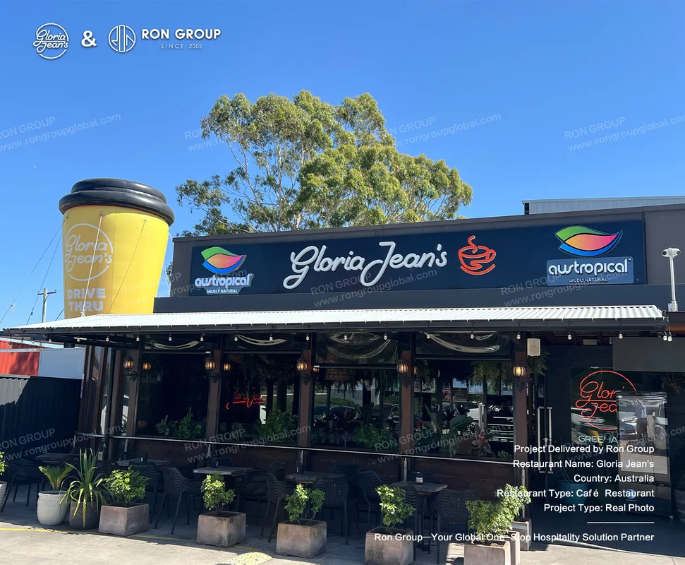 Modern Gloria Jean's storefront with outdoor seating