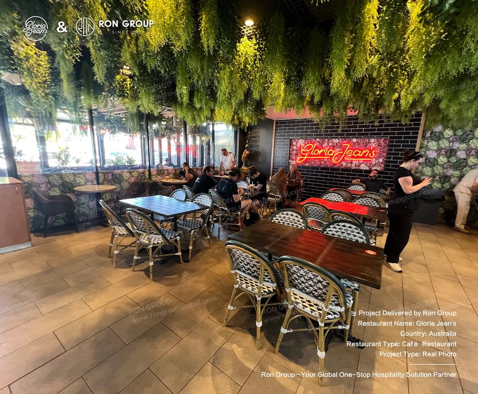 Gloria Jean's indoor seating with greenery