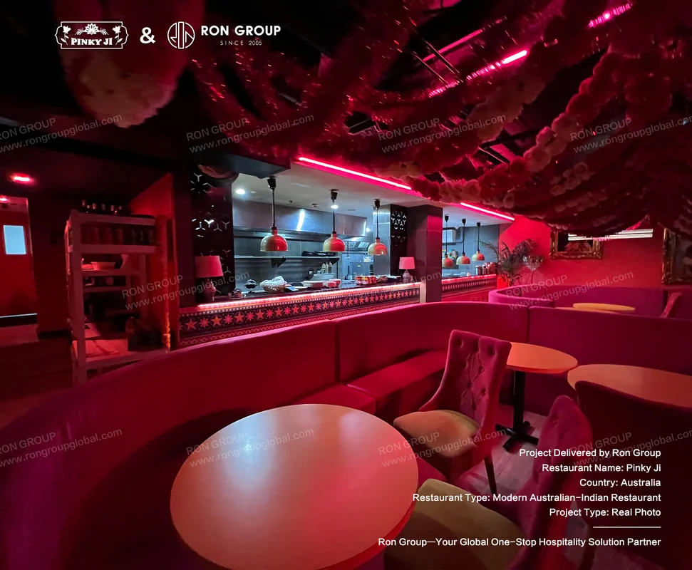 Pinky Ji red neon dining room with open kitchen