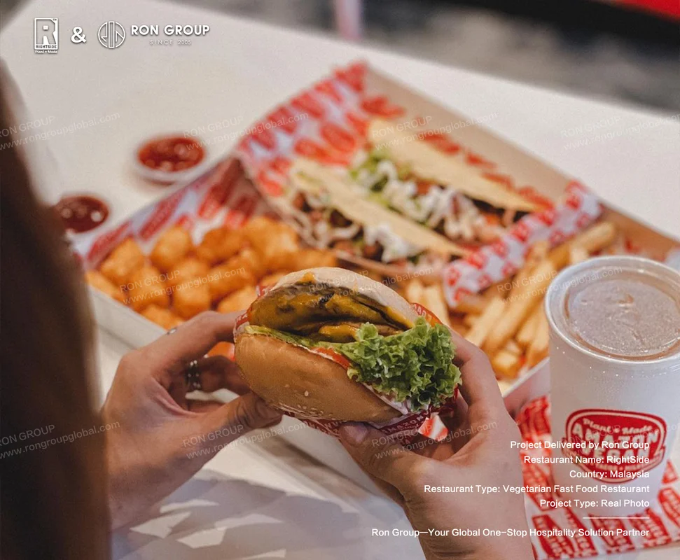 Rightside Fast Food RonGroup-Rightside_Fast_Food-Hands_Holding_Burger_With_Lettuce.webp