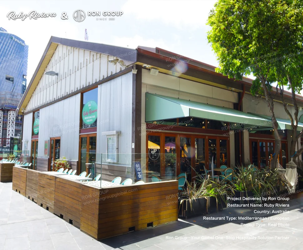 Ruby Riviera Restaurant Exterior With Green Awning