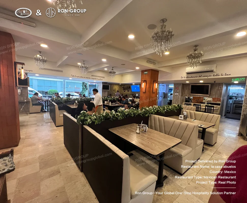 La Casa Abuelos RonGroup-A_Casa_Abuelos-Dining_Area_With_Chandeliers.webp