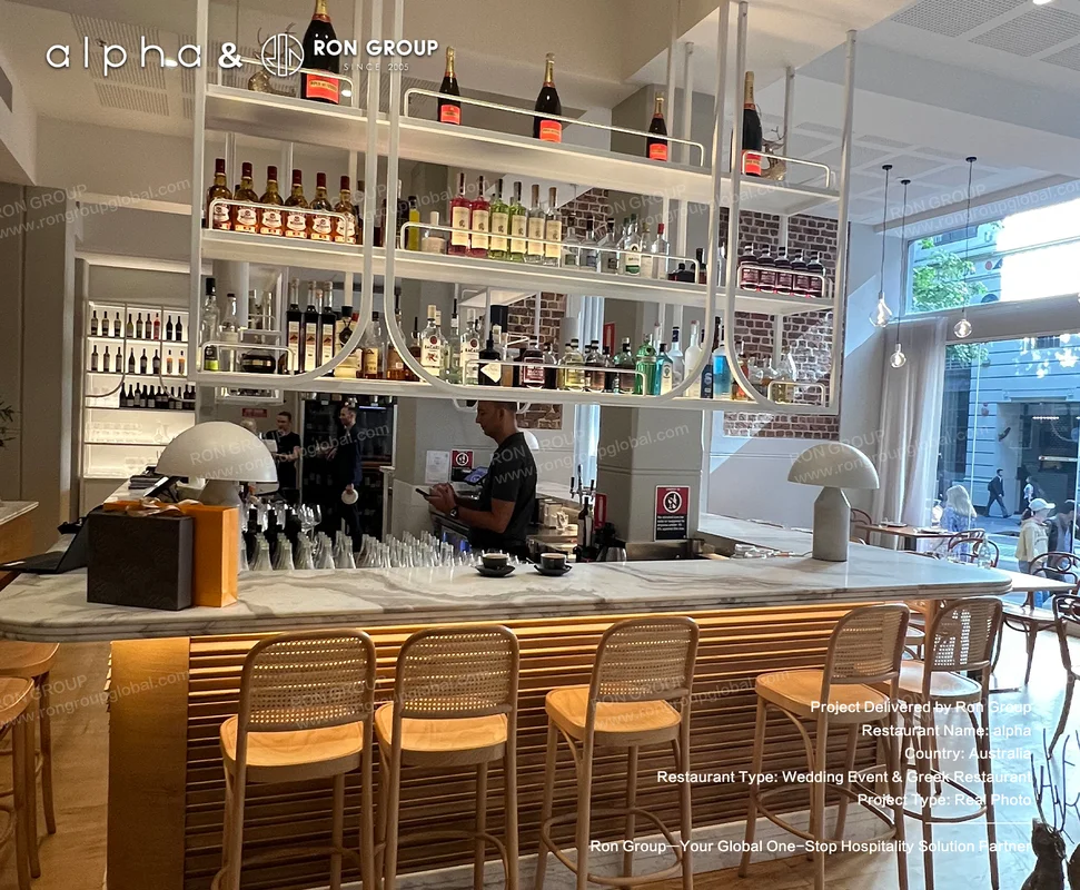 Alpha marble bar counter with slatted timber front and woven bar stools