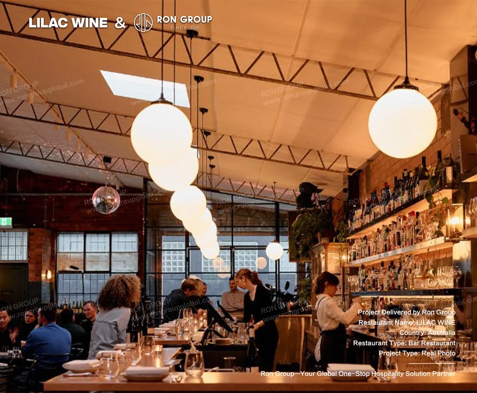 Lilac Wine Melbourne warehouse bar interior with globe pendant lights and timber bar
