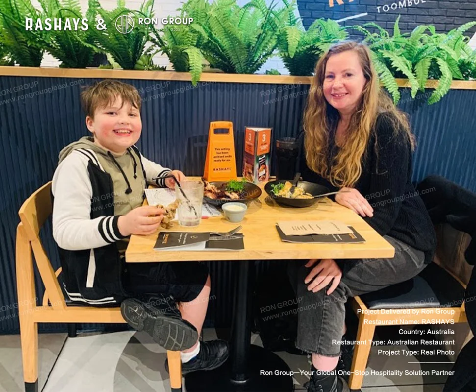 Rashays RonGroup-Rashays-Woman_And_Child_Dining_Together.webp