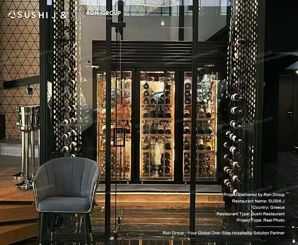 Sushi J illuminated glass wine display cabinet and perforated metal bottle racks