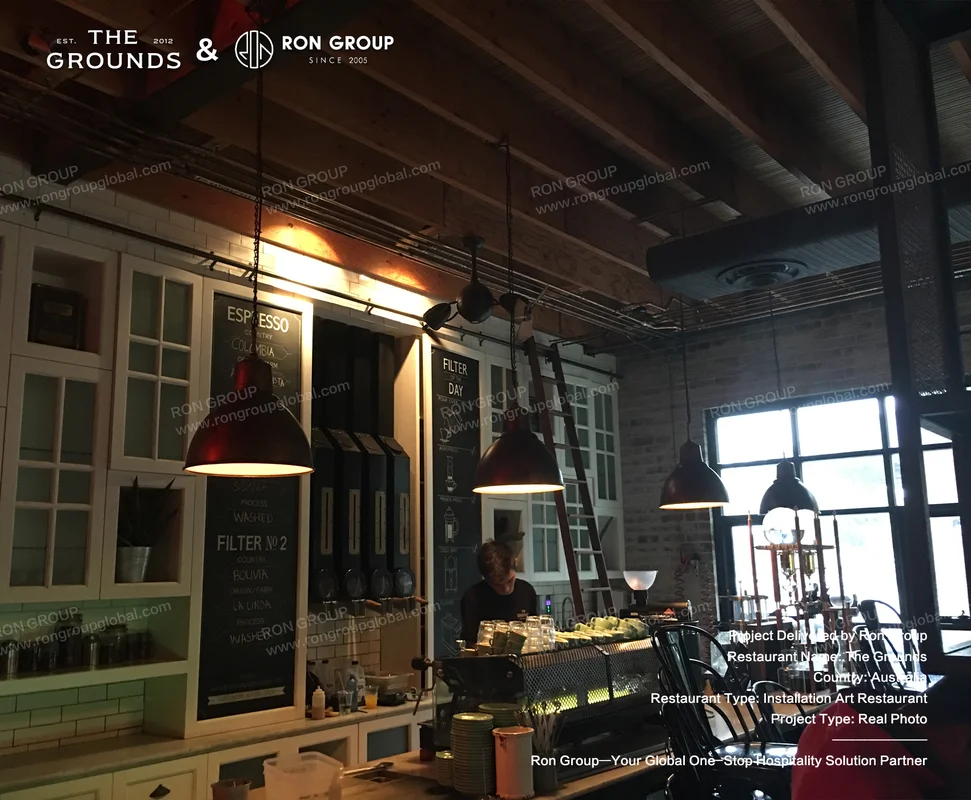 Rustic industrial cafe counter with exposed timber beams and vintage pendant lighting at Sydney Garden Restaurant