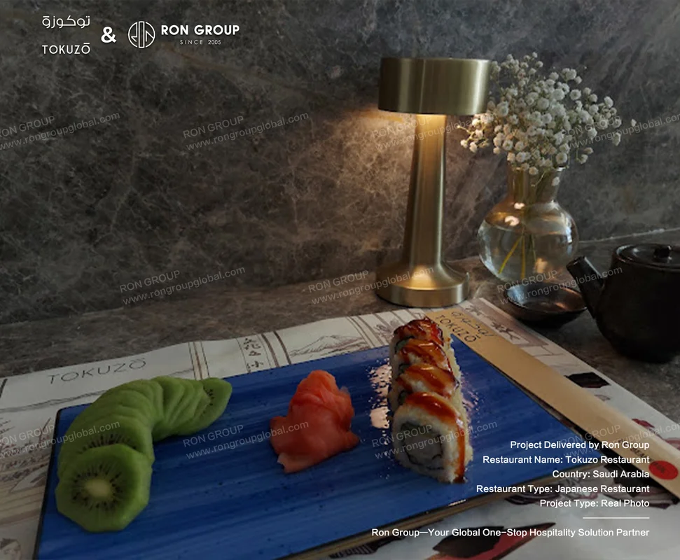 Tokuzo Restaurant RonGroup-Tokuzo_Restaurant-Sushi_Platter_On_Blue_Plate.webp