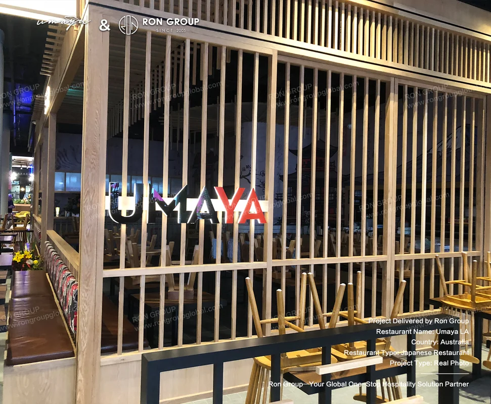 UMAYA custom timber slat partition with illuminated brand sign