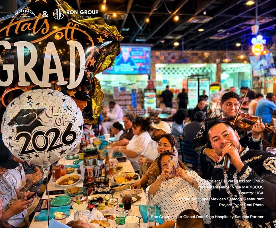 Vida Mariscos RonGroup-Vida_Mariscos-Graduation_Celebration_In_Restaurant.webp
