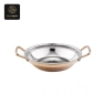 A copper-colored serving pan with a hammered silver interior and two handles.