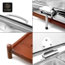 Close-up collage of the rectangular chafing dish's handle, lid mechanism, and wooden base details.