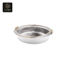 A divided round chafer dish with a hammered silver interior and golden rim.