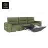 A green modular sofa paired with a black geometric coffee table.