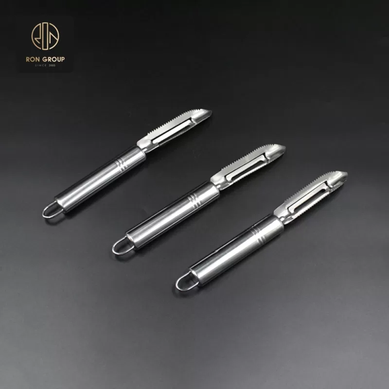Multi-purpose stainless steel peeler