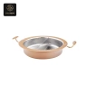 A single copper-colored oval chafing dish with a hammered, divided silver interior.