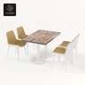 The unique pattern rectangular table with a white double-column base and four chairs.