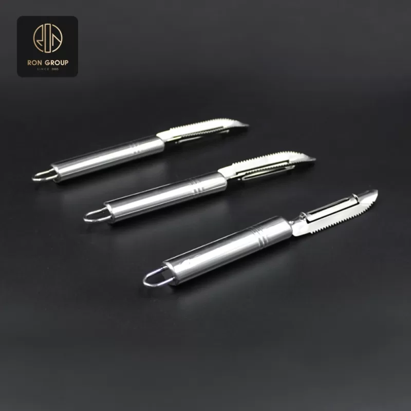 Multi-purpose stainless steel peeler