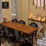RON GROUP Restaurant - Dining Area with Wicker Chairs and Candles