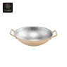 A gold-colored oval chafing dish with hammered silver interior and two handles.