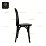 Side view of a black classic bentwood chair with a round seat.