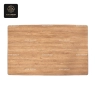 An overhead view of a light-colored wood grain table top from Series E.
