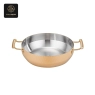 A deep, copper-colored serving pan with a hammered exterior and two handles.