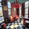 RON GROUP - Interior Design Project with red leather furniture and chandelier