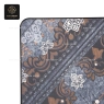 A close-up of a dark blue decorative table top with detailed patterns.