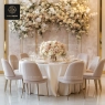 Modern banquet chair with a warm greige upholstery and gold metallic legs, perfect for upscale events and fine dining settings.