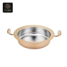 A single gold-colored oval chafing dish with a hammered silver interior and handles.