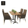 Beige high-back dining armchairs arranged at a rectangular table.