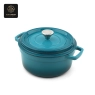 A blue enamel cast iron dutch oven with a lid, with a subtle 'Success' embossing.