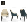 Front, side, and back views of a cream and blue two-tone armchair.