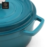 A close-up view of the handle and lid of a blue enamel cast iron dutch oven.