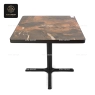 A front view of a square dining table with a stone-like top and a solid black pedestal base.