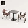 A set of five different colored rectangular stone table tops with rounded corners.