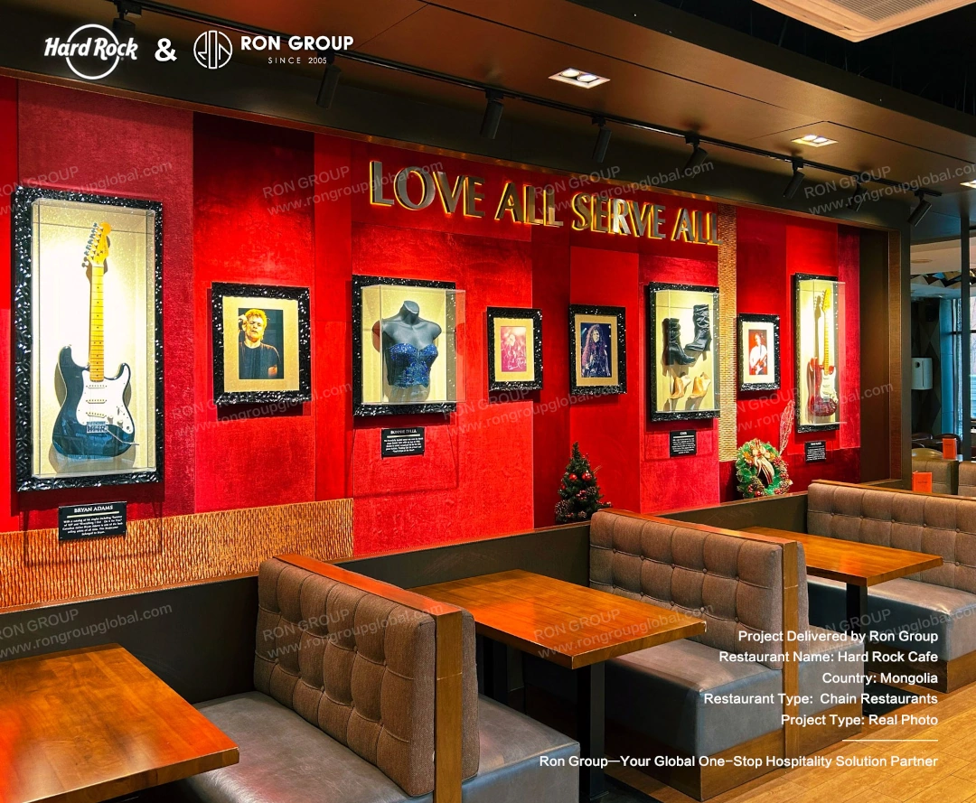Immersive Hard Rock Cafe dining atmosphere Wide view of Hard Rock Cafe dining atmosphere with stage, lighting, and branded interior