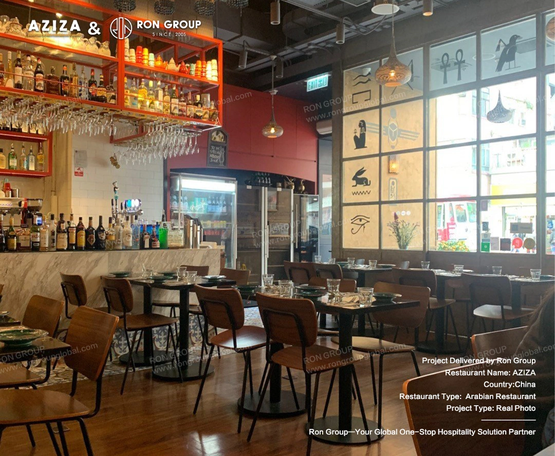 Modern Arabian bar area with dining nook and warm lighting